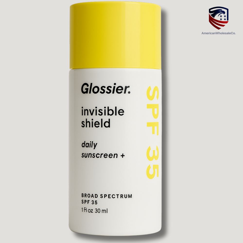 Glossier Invisible Shield sunscreen bottle – 30 mL clear daily SPF 35 with bright yellow cap and minimal packaging.
